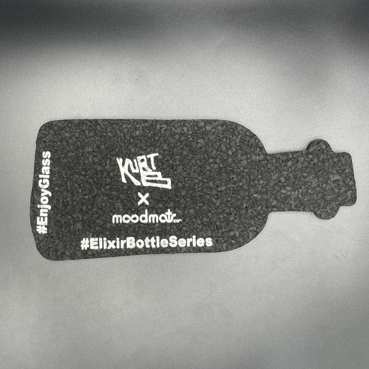 Kurt B. Elixir Bottle Moodmat